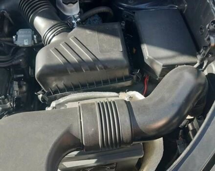 Черный Хендай Туксон, объемом двигателя 1.98 л и пробегом 176 тыс. км за 8200 $, фото 5 на Automoto.ua