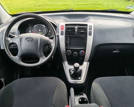 Чорний Хендай Туксон, об'ємом двигуна 1.98 л та пробігом 148 тис. км за 6199 $, фото 10 на Automoto.ua