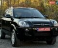 Черный Хендай Туксон, объемом двигателя 2 л и пробегом 110 тыс. км за 8899 $, фото 1 на Automoto.ua
