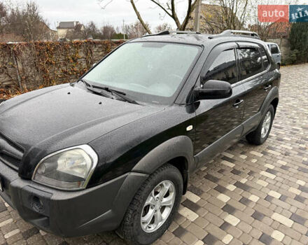 Черный Хендай Туксон, объемом двигателя 2.66 л и пробегом 205 тыс. км за 10000 $, фото 56 на Automoto.ua