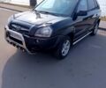 Черный Хендай Туксон, объемом двигателя 2 л и пробегом 182 тыс. км за 9200 $, фото 3 на Automoto.ua
