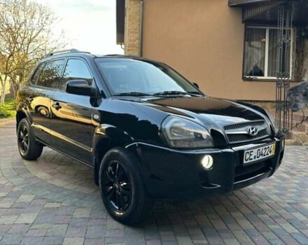 Черный Хендай Туксон, объемом двигателя 1.98 л и пробегом 198 тыс. км за 8250 $, фото 8 на Automoto.ua