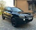 Черный Хендай Туксон, объемом двигателя 1.98 л и пробегом 198 тыс. км за 8250 $, фото 8 на Automoto.ua