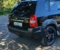 Черный Хендай Туксон, объемом двигателя 2 л и пробегом 236 тыс. км за 7400 $, фото 4 на Automoto.ua