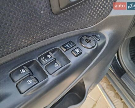 Черный Хендай Туксон, объемом двигателя 1.98 л и пробегом 233 тыс. км за 7850 $, фото 7 на Automoto.ua