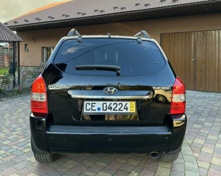 Черный Хендай Туксон, объемом двигателя 1.98 л и пробегом 198 тыс. км за 8250 $, фото 3 на Automoto.ua