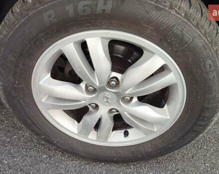 Чорний Хендай Туксон, об'ємом двигуна 2 л та пробігом 157 тис. км за 10000 $, фото 5 на Automoto.ua