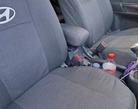 Черный Хендай Туксон, объемом двигателя 2 л и пробегом 226 тыс. км за 8700 $, фото 6 на Automoto.ua