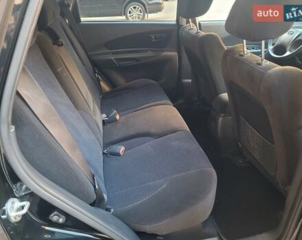 Черный Хендай Туксон, объемом двигателя 2 л и пробегом 135 тыс. км за 9750 $, фото 29 на Automoto.ua