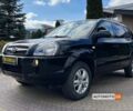 Чорний Хендай Туксон, об'ємом двигуна 2 л та пробігом 246 тис. км за 7999 $, фото 2 на Automoto.ua
