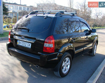 Черный Хендай Туксон, объемом двигателя 2 л и пробегом 162 тыс. км за 8200 $, фото 8 на Automoto.ua