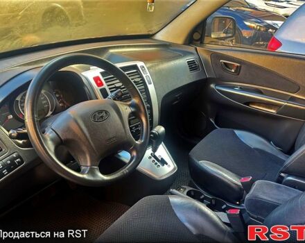 Черный Хендай Туксон, объемом двигателя 2 л и пробегом 91 тыс. км за 10999 $, фото 8 на Automoto.ua