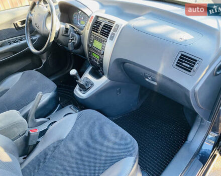 Черный Хендай Туксон, объемом двигателя 1.99 л и пробегом 95 тыс. км за 8500 $, фото 9 на Automoto.ua