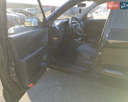 Черный Хендай Туксон, объемом двигателя 1.99 л и пробегом 159 тыс. км за 9700 $, фото 23 на Automoto.ua