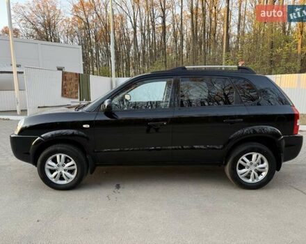 Черный Хендай Туксон, объемом двигателя 2 л и пробегом 148 тыс. км за 8700 $, фото 3 на Automoto.ua