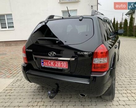 Черный Хендай Туксон, объемом двигателя 2 л и пробегом 114 тыс. км за 8850 $, фото 9 на Automoto.ua