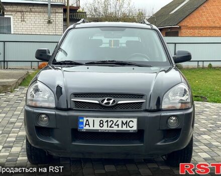 Чорний Хендай Туксон, об'ємом двигуна 2 л та пробігом 200 тис. км за 8499 $, фото 1 на Automoto.ua