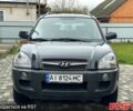 Чорний Хендай Туксон, об'ємом двигуна 2 л та пробігом 200 тис. км за 8499 $, фото 1 на Automoto.ua