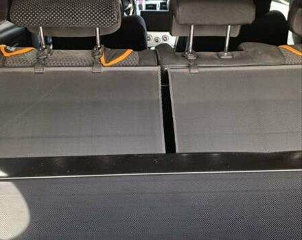 Черный Хендай Туксон, объемом двигателя 2 л и пробегом 226 тыс. км за 8700 $, фото 14 на Automoto.ua