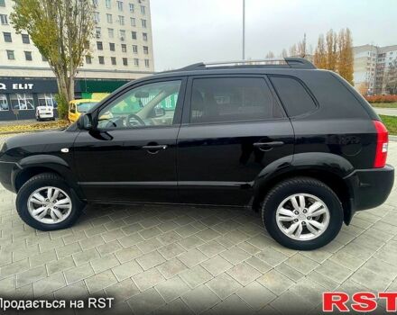 Черный Хендай Туксон, объемом двигателя 2 л и пробегом 168 тыс. км за 7700 $, фото 6 на Automoto.ua
