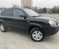 Черный Хендай Туксон, объемом двигателя 2 л и пробегом 168 тыс. км за 7500 $, фото 1 на Automoto.ua