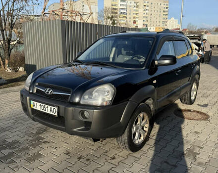 Черный Хендай Туксон, объемом двигателя 1.98 л и пробегом 220 тыс. км за 7500 $, фото 6 на Automoto.ua