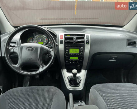 Чорний Хендай Туксон, об'ємом двигуна 2 л та пробігом 200 тис. км за 8450 $, фото 30 на Automoto.ua