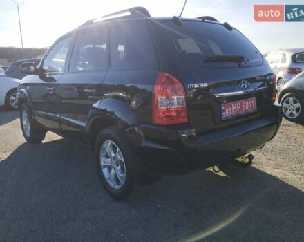 Черный Хендай Туксон, объемом двигателя 1.99 л и пробегом 159 тыс. км за 9700 $, фото 24 на Automoto.ua