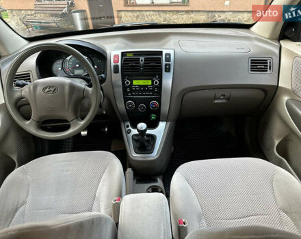 Хендай Туксон 2009 в Калуше на Automoto.ua Черный Хендай Туксон, объемом двигателя 1.98 л и пробегом 198 тыс. км за 7500 $, фото 37 на Automoto.ua