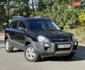 Черный Хендай Туксон, объемом двигателя 1.98 л и пробегом 180 тыс. км за 8800 $, фото 1 на Automoto.ua