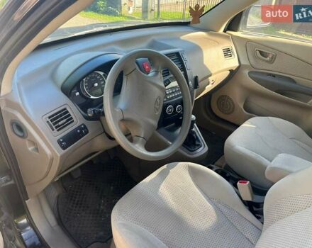 Чорний Хендай Туксон, об'ємом двигуна 2 л та пробігом 187 тис. км за 7900 $, фото 8 на Automoto.ua