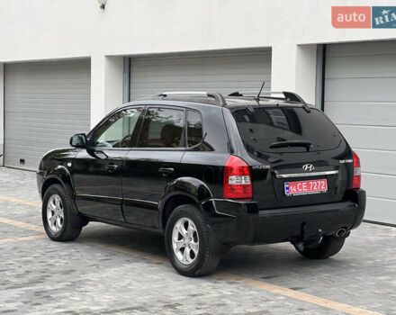Чорний Хендай Туксон, об'ємом двигуна 2 л та пробігом 163 тис. км за 9199 $, фото 7 на Automoto.ua