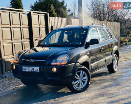 Черный Хендай Туксон, объемом двигателя 1.99 л и пробегом 95 тыс. км за 8500 $, фото 30 на Automoto.ua