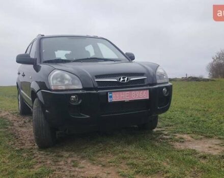 Черный Хендай Туксон, объемом двигателя 2 л и пробегом 198 тыс. км за 8200 $, фото 1 на Automoto.ua
