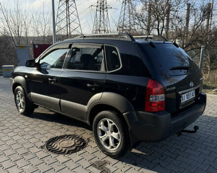 Черный Хендай Туксон, объемом двигателя 1.98 л и пробегом 220 тыс. км за 7500 $, фото 8 на Automoto.ua