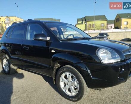 Черный Хендай Туксон, объемом двигателя 1.99 л и пробегом 159 тыс. км за 9700 $, фото 26 на Automoto.ua