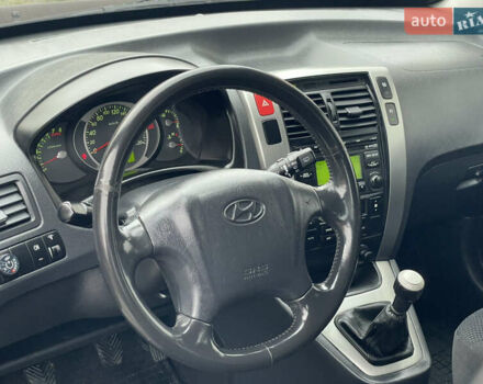 Чорний Хендай Туксон, об'ємом двигуна 2 л та пробігом 200 тис. км за 8450 $, фото 24 на Automoto.ua