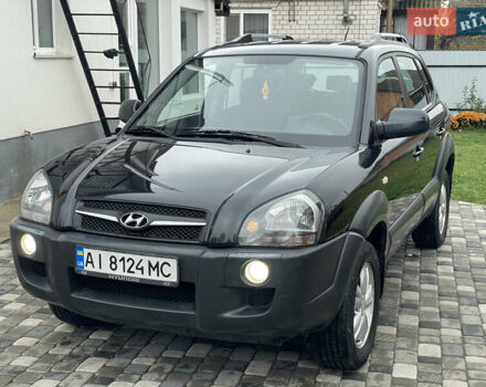 Чорний Хендай Туксон, об'ємом двигуна 2 л та пробігом 200 тис. км за 8450 $, фото 13 на Automoto.ua