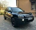 Черный Хендай Туксон, объемом двигателя 1.98 л и пробегом 198 тыс. км за 8250 $, фото 6 на Automoto.ua