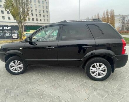 Черный Хендай Туксон, объемом двигателя 2 л и пробегом 168 тыс. км за 7500 $, фото 6 на Automoto.ua