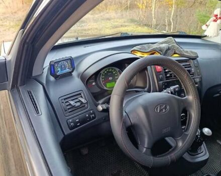 Чорний Хендай Туксон, об'ємом двигуна 1.98 л та пробігом 172 тис. км за 9500 $, фото 18 на Automoto.ua