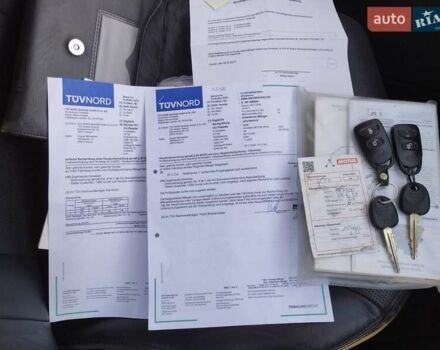 Черный Хендай Туксон, объемом двигателя 1.99 л и пробегом 159 тыс. км за 9700 $, фото 2 на Automoto.ua