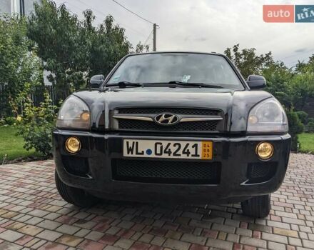 Чорний Хендай Туксон, об'ємом двигуна 2 л та пробігом 217 тис. км за 7700 $, фото 6 на Automoto.ua