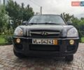 Чорний Хендай Туксон, об'ємом двигуна 2 л та пробігом 217 тис. км за 7700 $, фото 6 на Automoto.ua