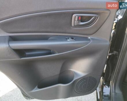 Черный Хендай Туксон, объемом двигателя 1.99 л и пробегом 159 тыс. км за 9700 $, фото 17 на Automoto.ua