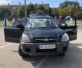 Черный Хендай Туксон, объемом двигателя 1.98 л и пробегом 208 тыс. км за 7500 $, фото 1 на Automoto.ua