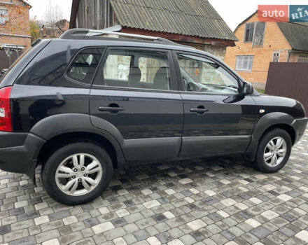 Чорний Хендай Туксон, об'ємом двигуна 2 л та пробігом 200 тис. км за 8450 $, фото 8 на Automoto.ua