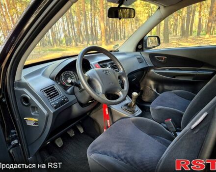 Черный Хендай Туксон, объемом двигателя 2 л и пробегом 204 тыс. км за 8900 $, фото 5 на Automoto.ua