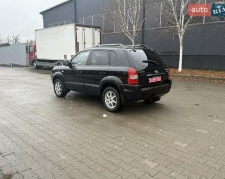 Черный Хендай Туксон, объемом двигателя 2 л и пробегом 237 тыс. км за 8350 $, фото 7 на Automoto.ua