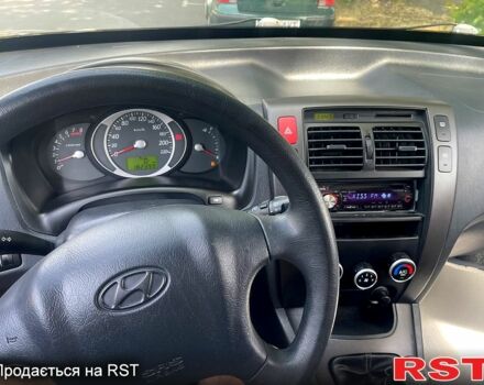 Чорний Хендай Туксон, об'ємом двигуна 2 л та пробігом 182 тис. км за 8700 $, фото 5 на Automoto.ua